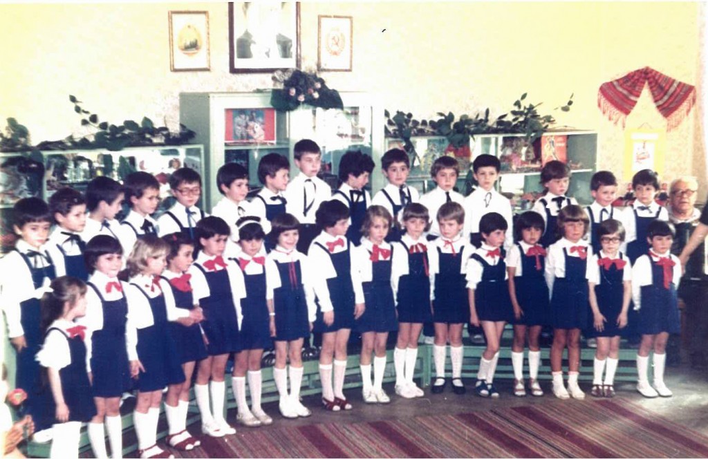 This is a picture of my wife Corina's elementary class in Oradea, Romania. She is the seventh from the left. Note the large picture of the dictator, Nicolae Ceausescu, on the wall behind them.
